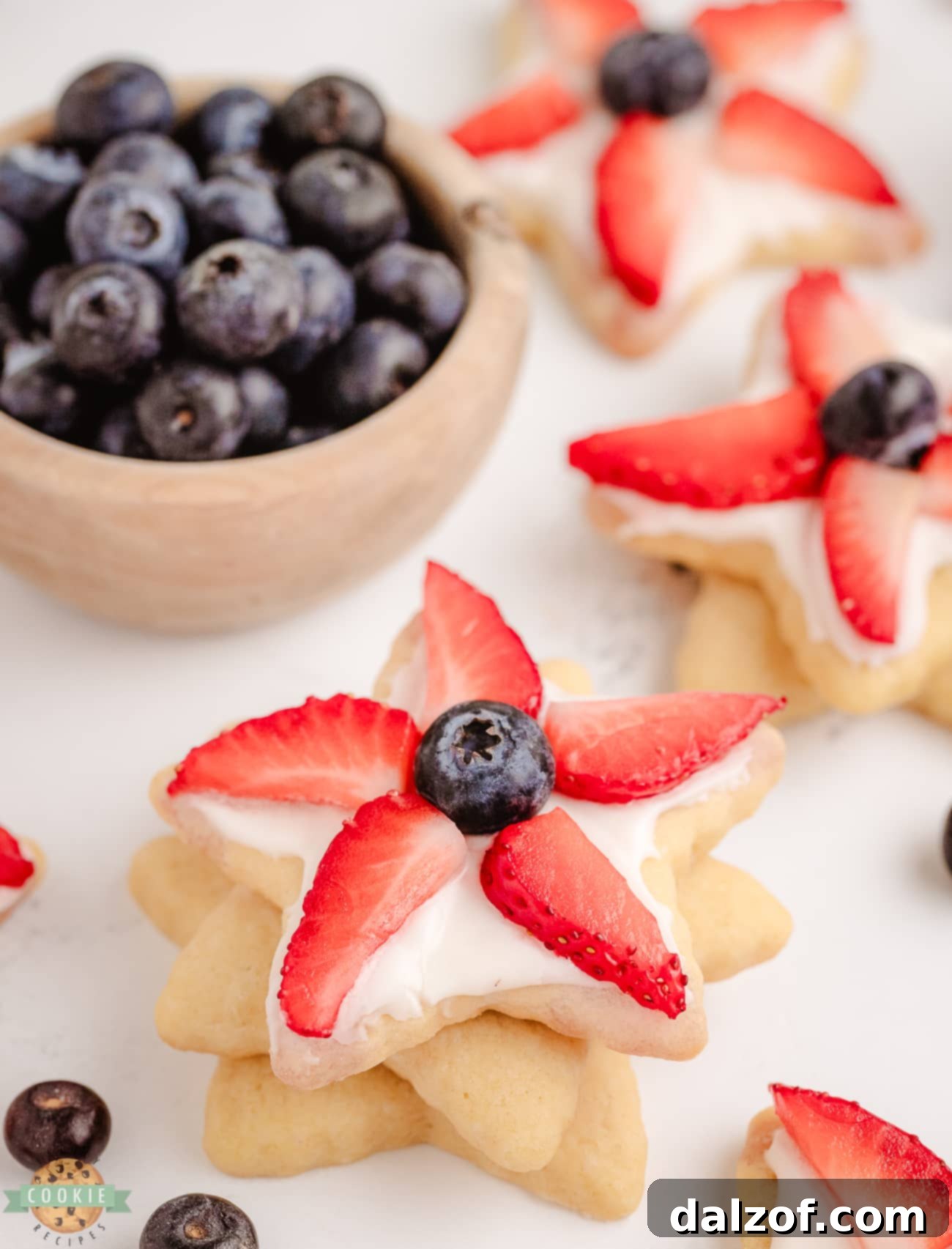 Stacks of beautifully decorated berry star cookies for the 4th of July holiday
