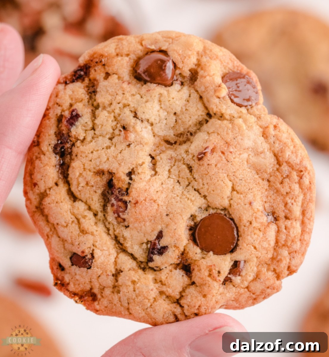 Scooping cookie dough onto a baking sheet with a cookie scoop