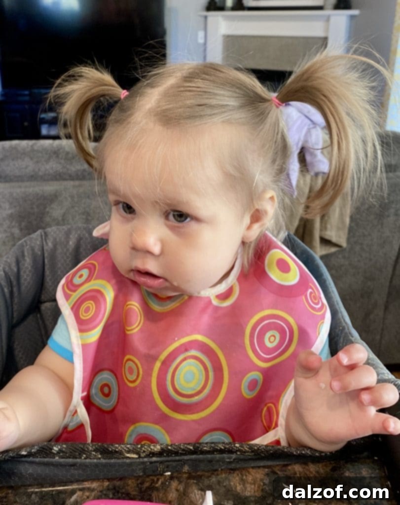 Baby B with her first pigtails, a sweet personal moment