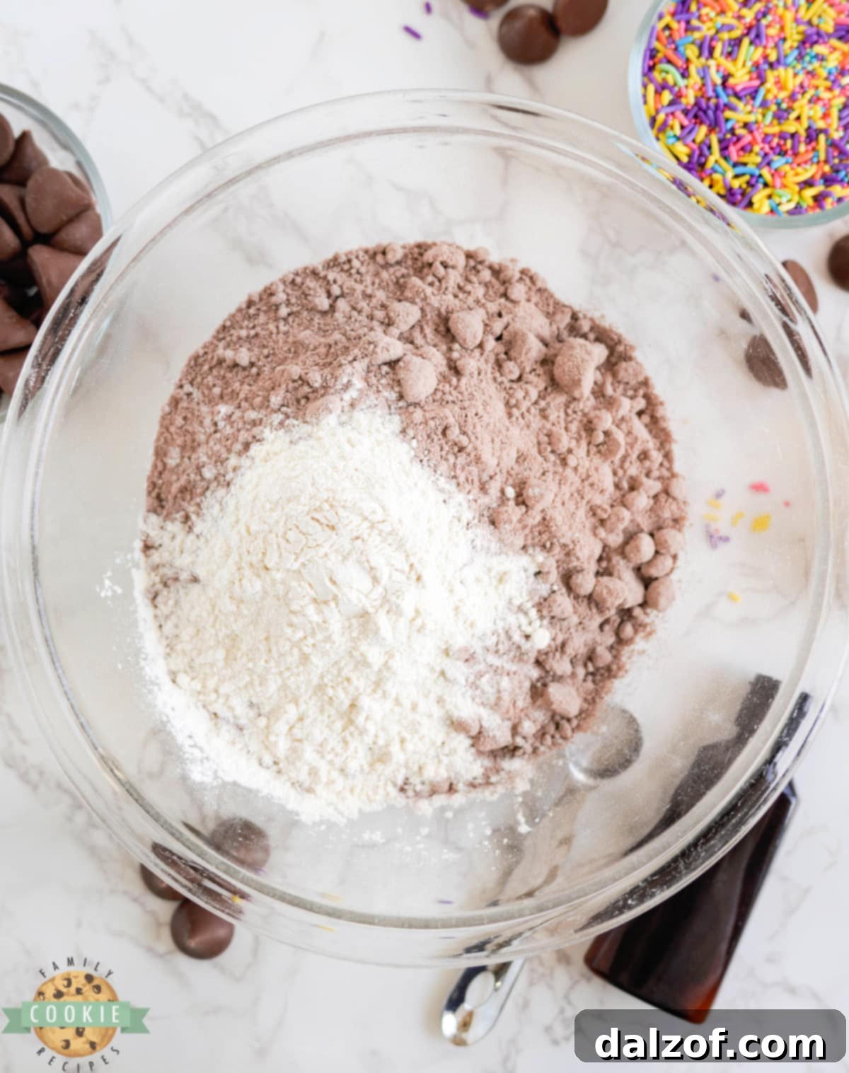 Mixing flour and brownie mix together. 