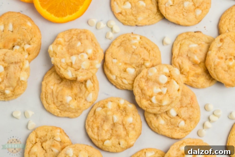 Dreamy Orange Creamsicle Cookies 2 Orange Creamsicle Cookies: Soft and chewy cookies with bright orange flavor and sweet white chocolate chips.