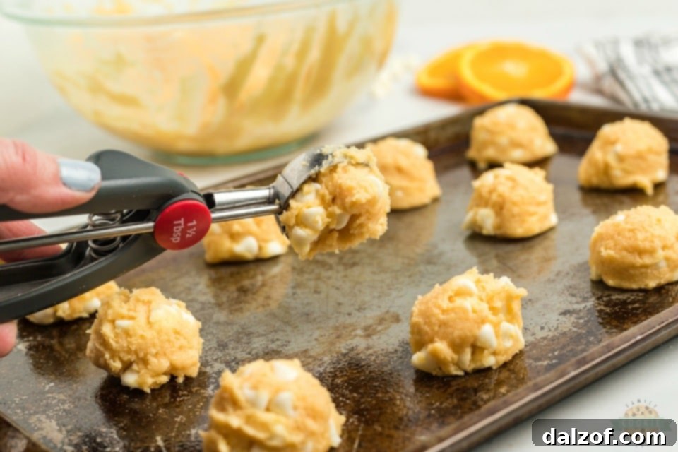 Dreamy Orange Creamsicle Cookies 7 Freshly baked Orange Creamsicle Cookies cooling on a rack.