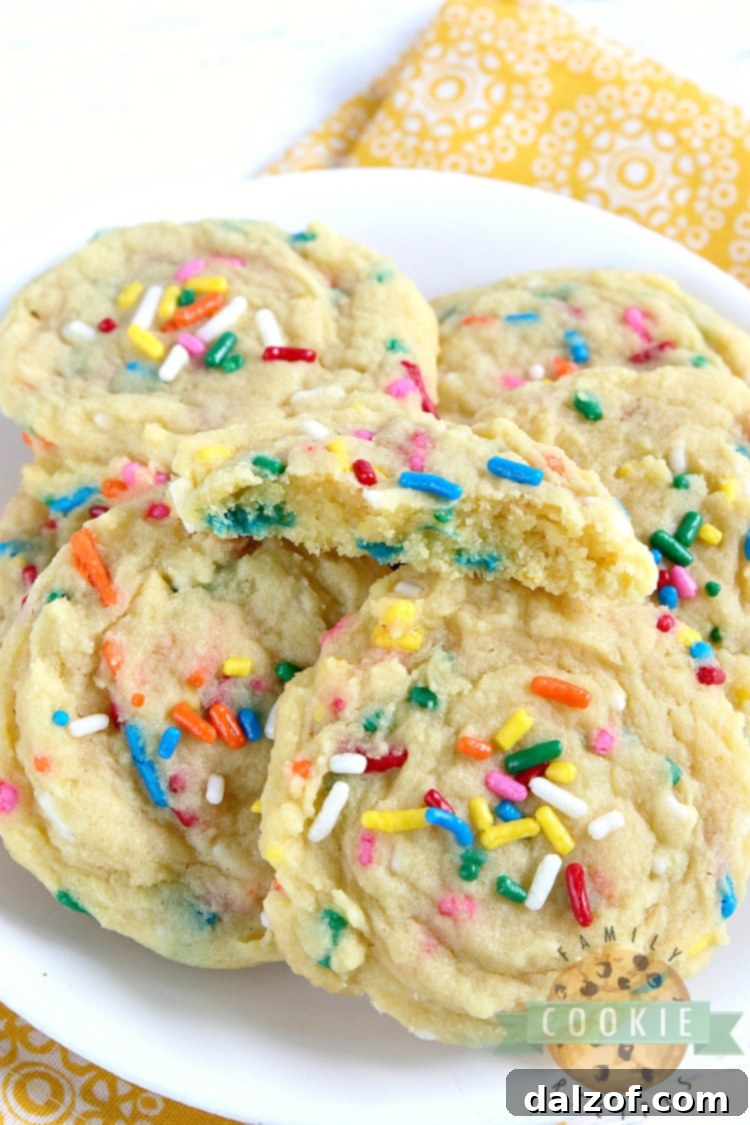 Soft and chewy Birthday Cake Cookies topped with colorful sprinkles