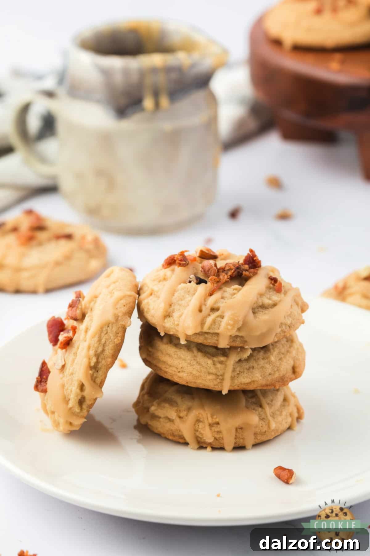 Sweet and Salty Maple Bacon Cookies 13 Maple cookies with bacon on top.