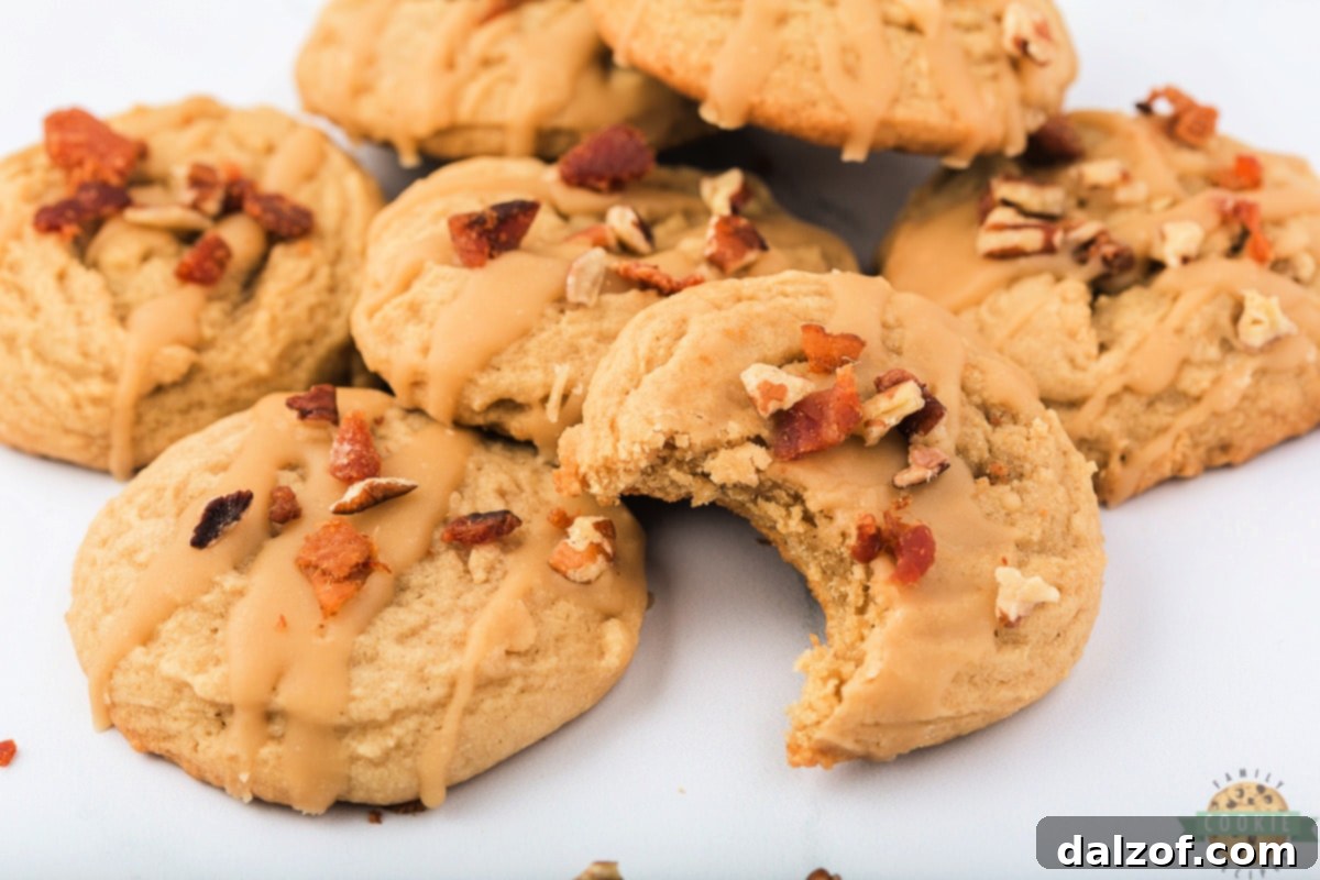 Sweet and Salty Maple Bacon Cookies 14 Maple Bacon Cookies are made with bacon grease and maple syrup and are topped with maple icing and crumbled bacon. These cookies are the perfect combination of savory and sweet!
