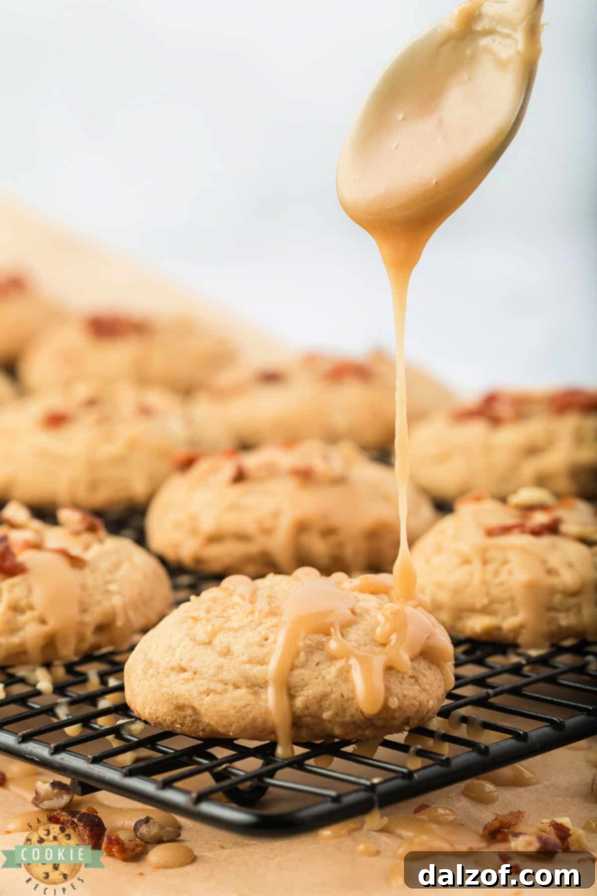 Sweet and Salty Maple Bacon Cookies 9 Drizzling maple glaze on top of baked cookies.
