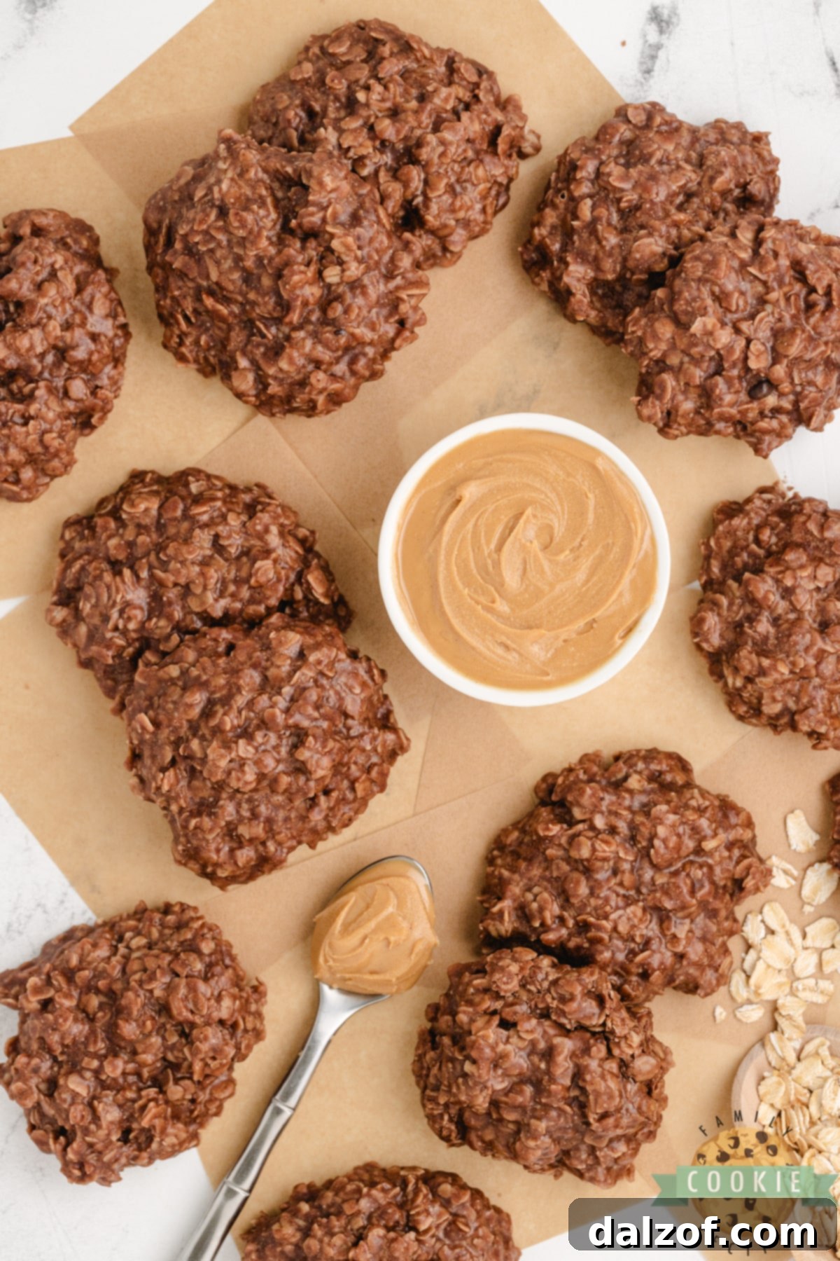 Close-up of a single no-bake cookie, highlighting the texture created by peanut butter, chocolate, and oats, ready to be enjoyed.