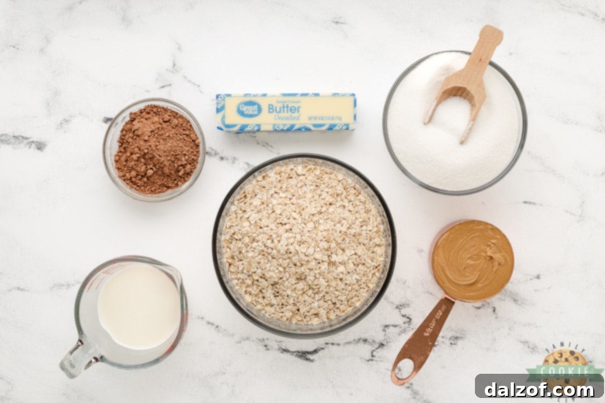 A vibrant flat lay showcasing all the simple ingredients required to make Microwave No-Bake Cookies: butter, milk, cocoa powder, sugar, peanut butter, and quick oats.