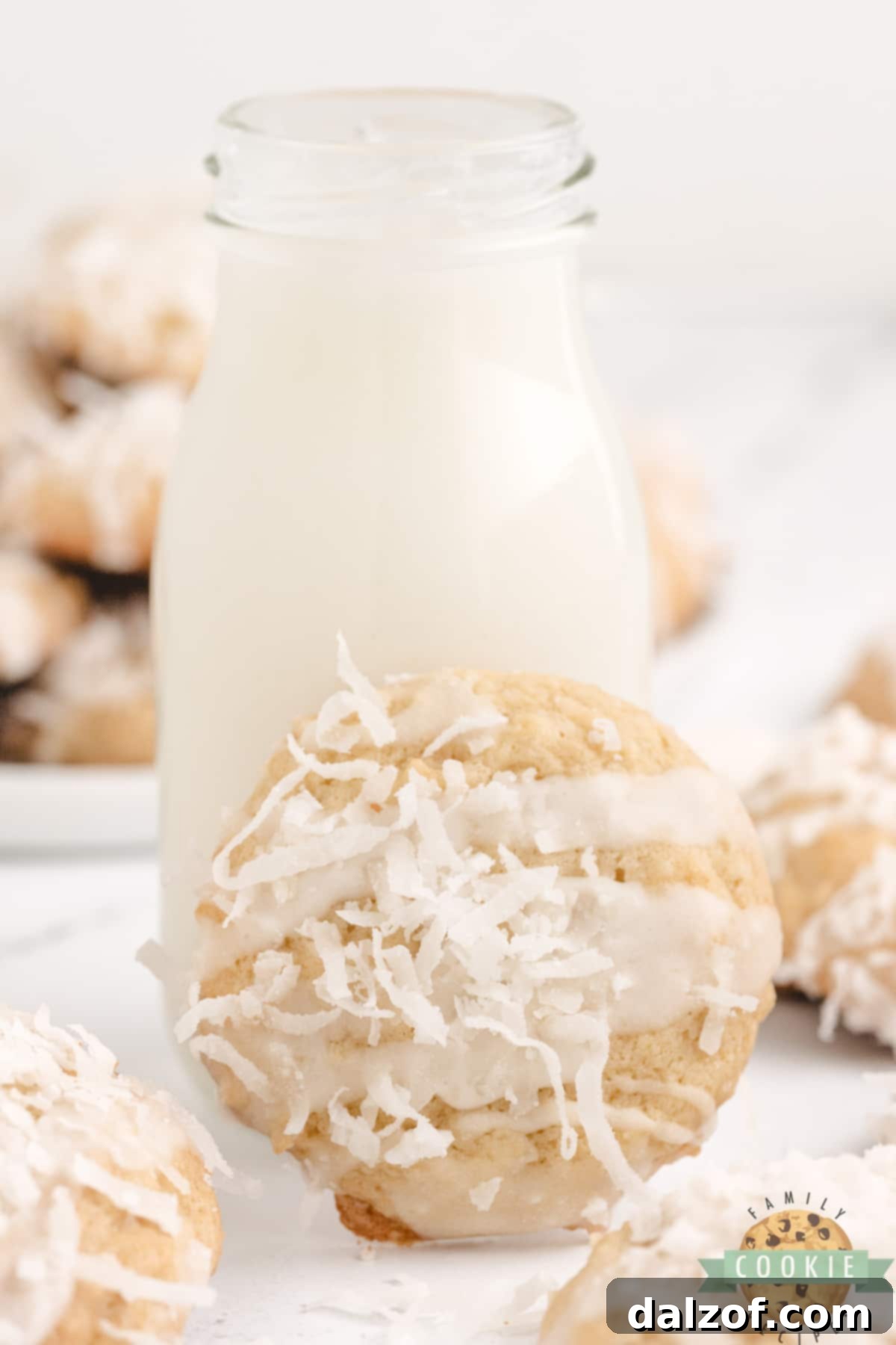 Pineapple coconut cookie with glaze and shredded coconut on top. 
