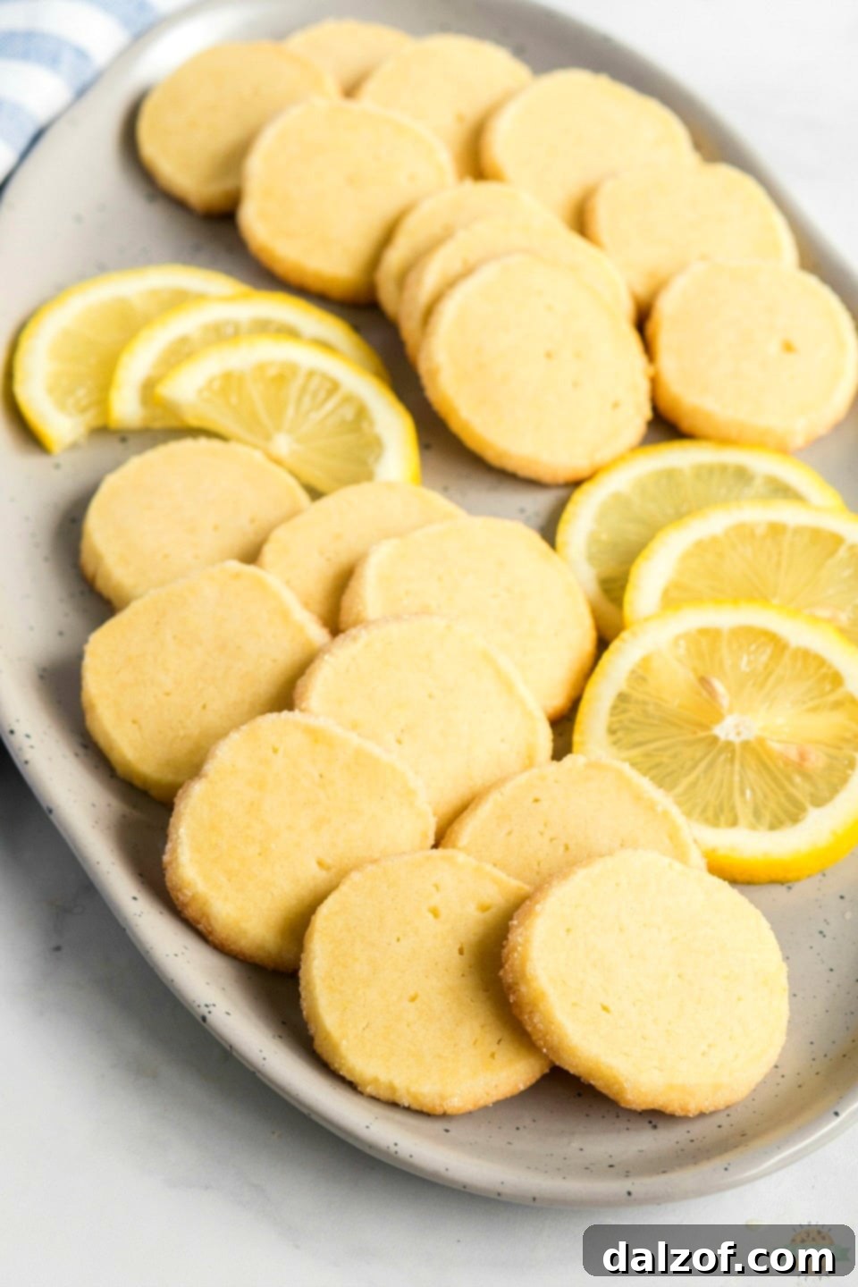 A vibrant platter of Lemon Slice and Bake Shortbread cookies, ready to be served or gifted.