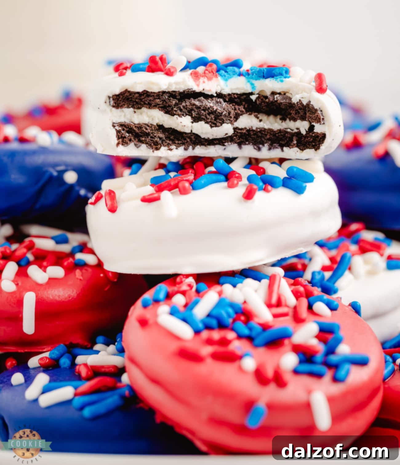 chocolate dipped Oreo cookies with a bite taken out