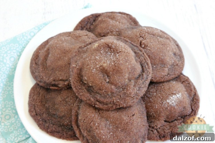 Freshly baked Buckeye Cookies cooling on a wire rack, showcasing their perfect round shape and sugar coating.