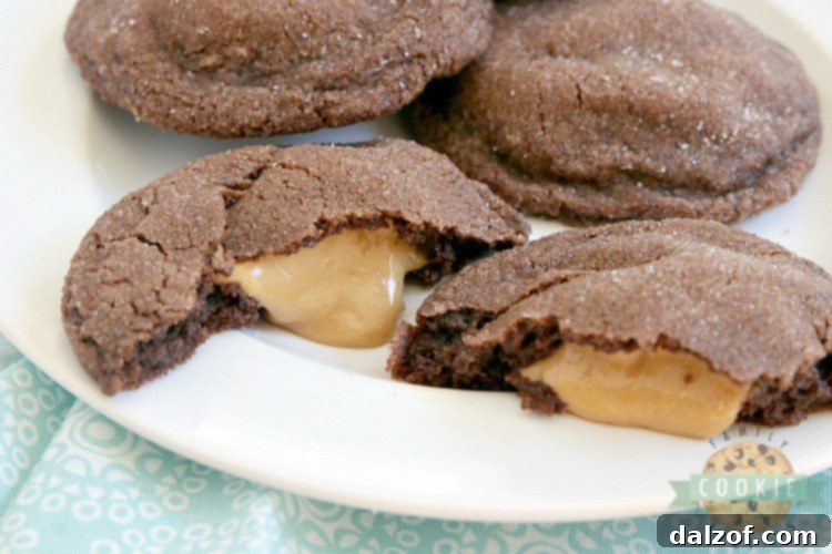 A freshly baked Buckeye Cookie with a perfect golden sugar crust, ready to be enjoyed.
