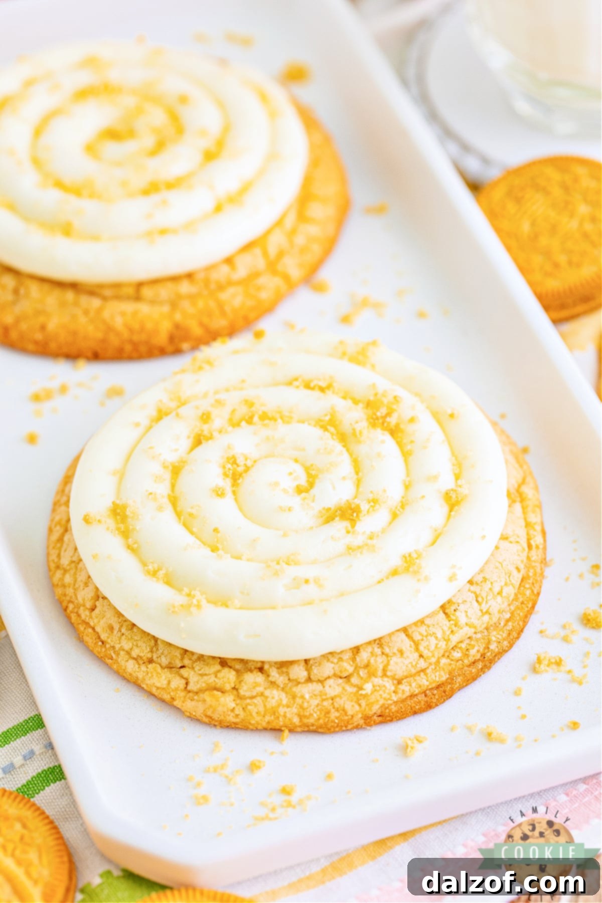 Crumbl-Inspired Golden Oreo Cookie Bliss 12 Vanilla cookie with cream cheese frosting.