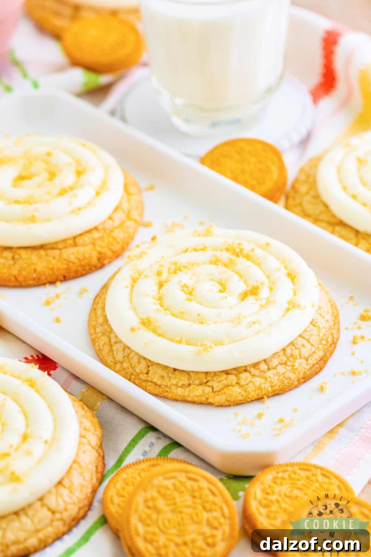 Crumbl-Inspired Golden Oreo Cookie Bliss 5 Vanilla cookies with cream cheese frosting and golden oreo crumbs.