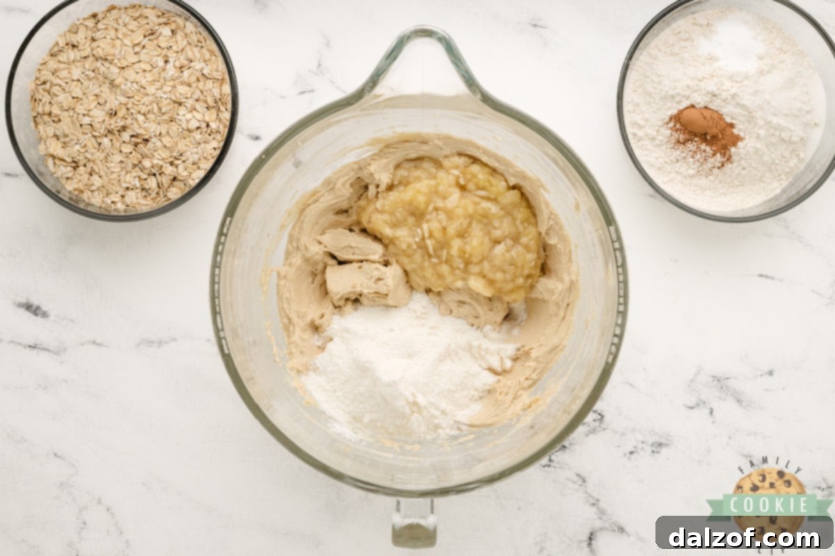 Wholesome Banana Oat Bliss 8 Adding banana cream pudding mix and mashed banana to the cookie dough