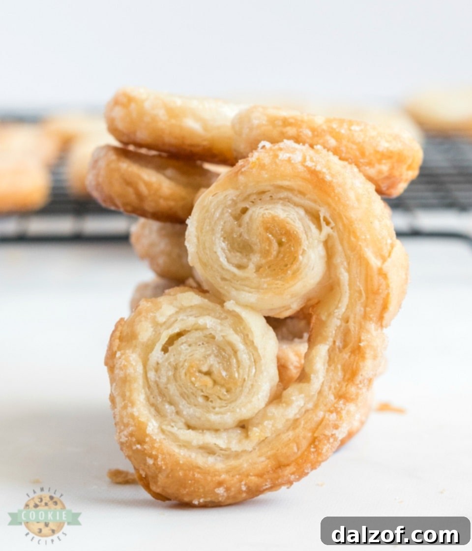 Easy Palmiers recipe, showing golden-brown, heart-shaped cookies ready to be served.