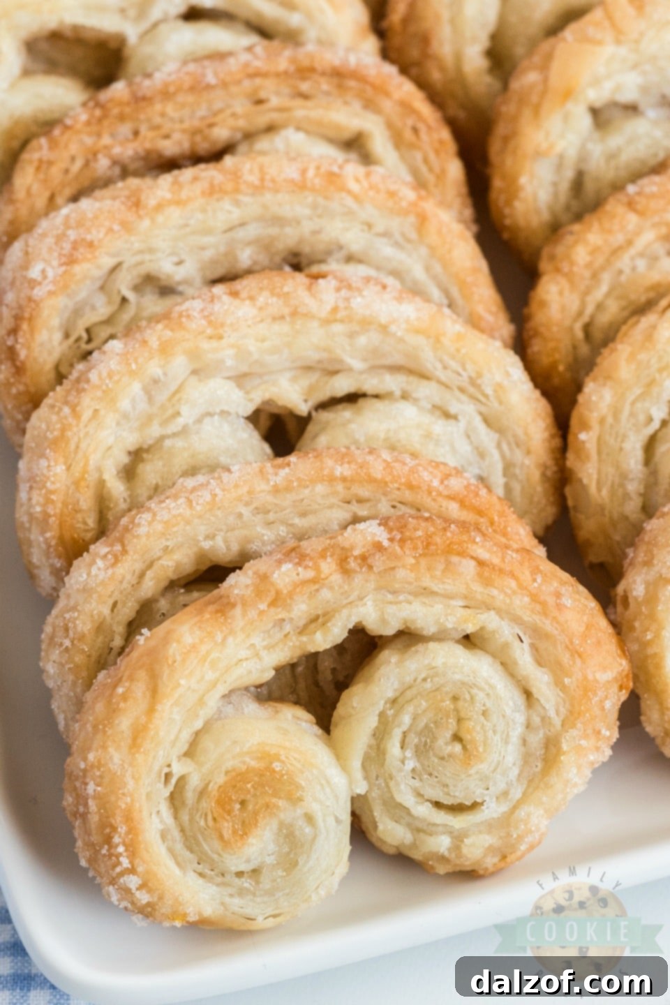 Easy Palmiers recipe, displaying a large platter of golden, crispy Palmiers.