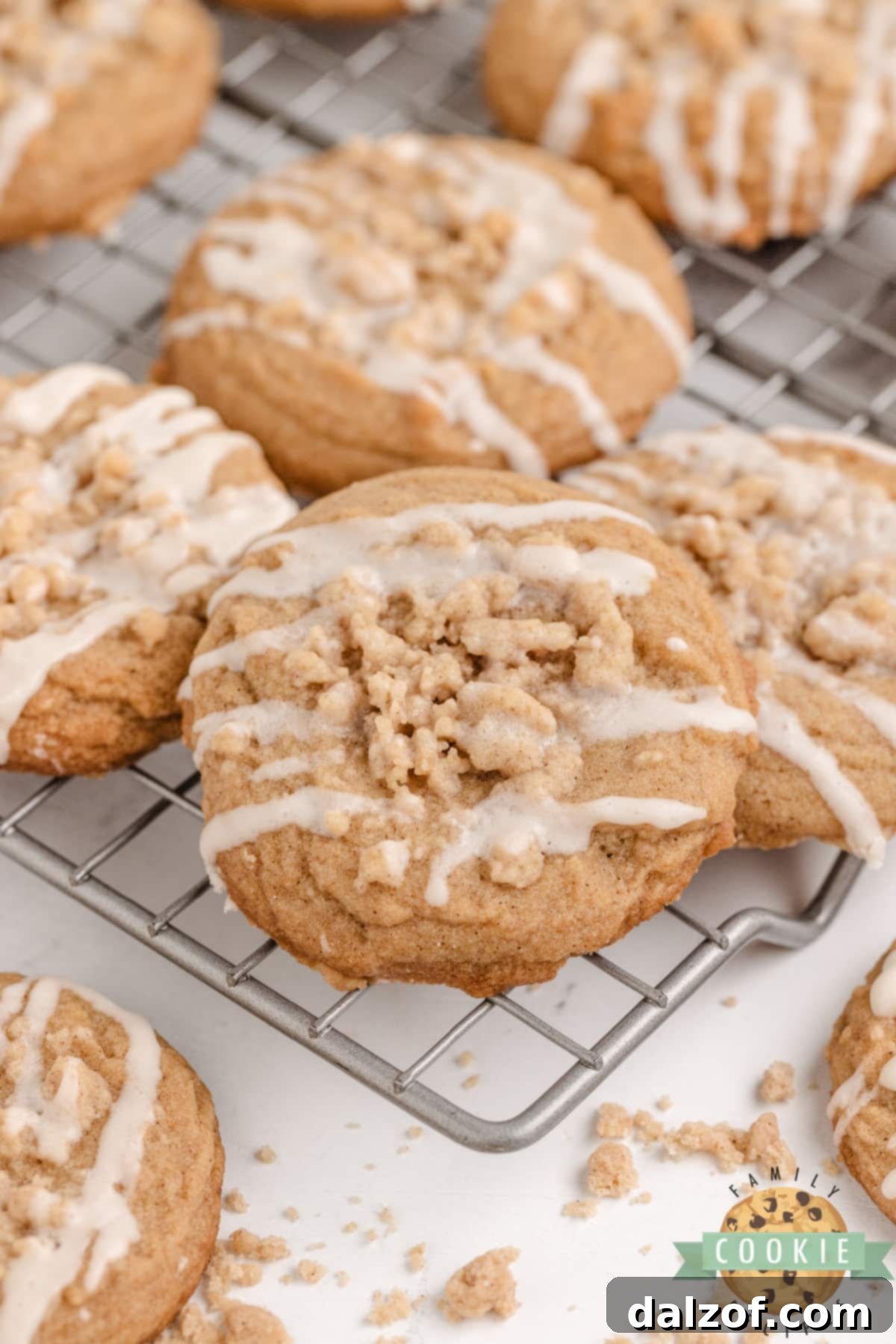 Coffee Cake Cookies are soft, chewy cinnamon cookies topped with a buttery streusel crumb topping and a drizzle of vanilla icing.