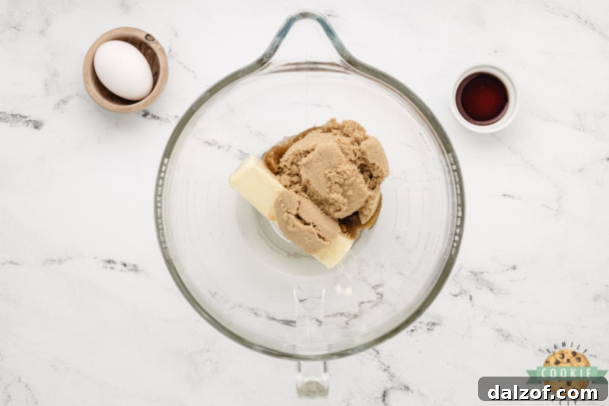 Creaming butter and brown sugar together. 