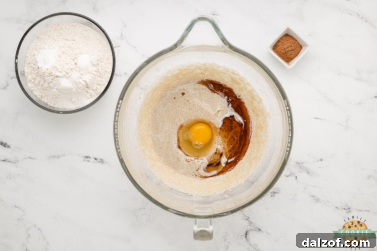 Add eggs and vanilla to creamed butter mixture.