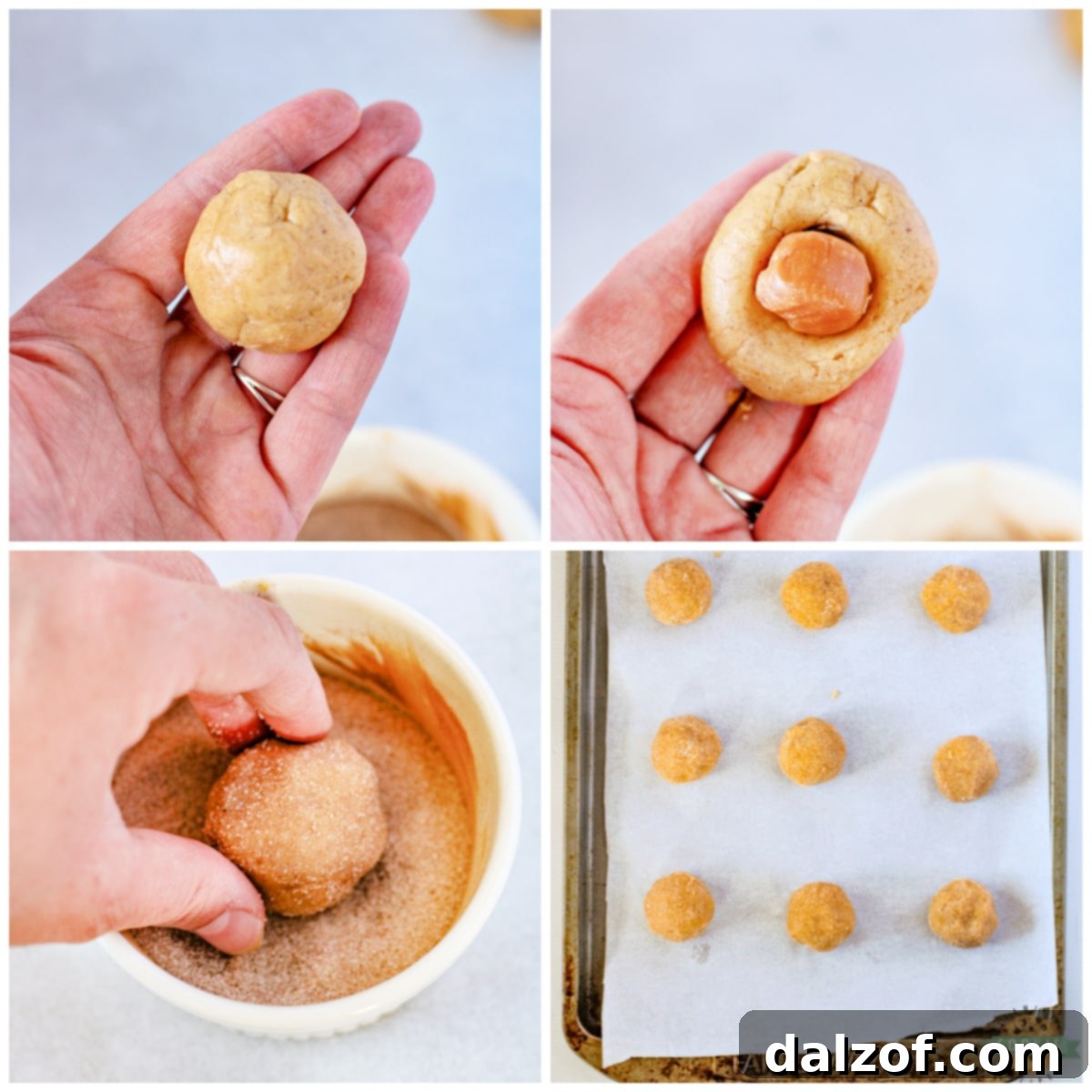 A hand gently enclosing a soft caramel candy within a ball of pumpkin snickerdoodle dough, demonstrating the stuffing process before coating.