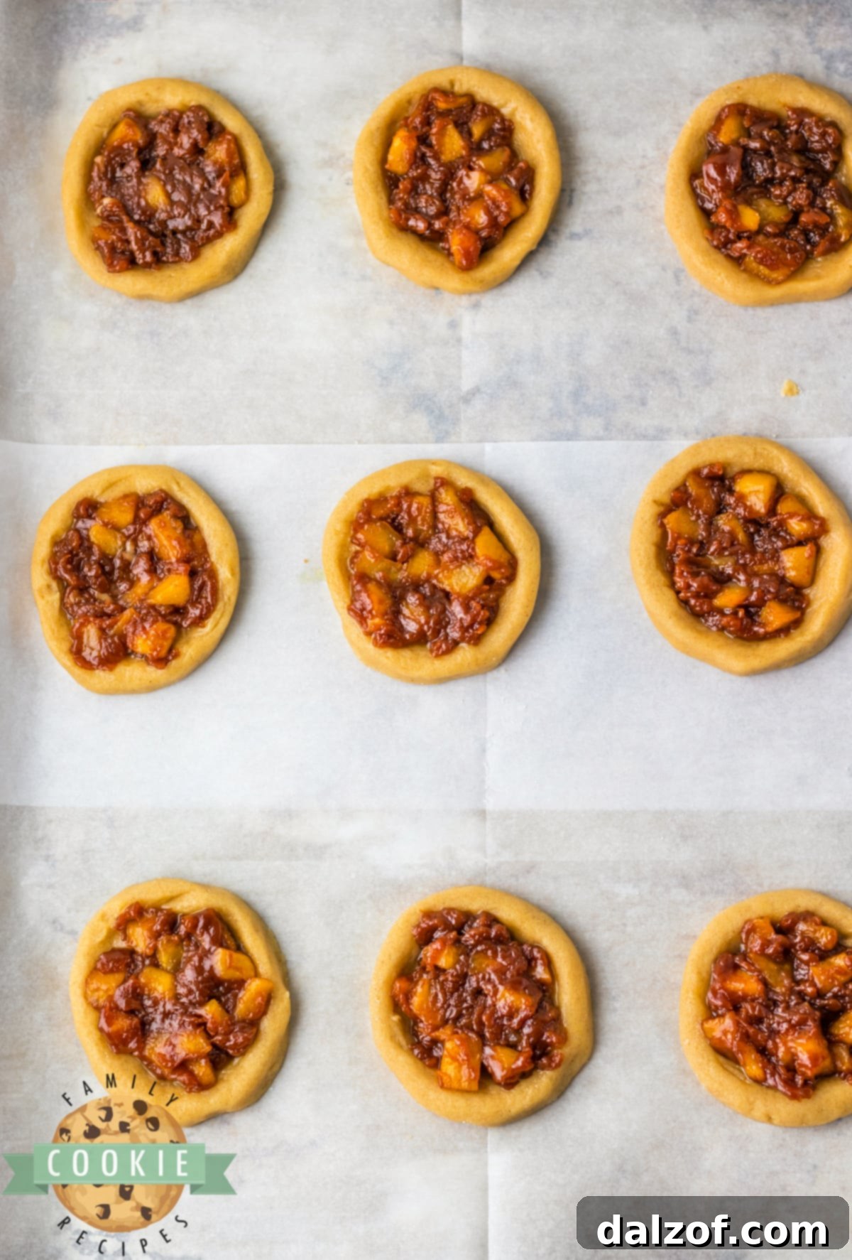 Apple filling on top of cookie dough.