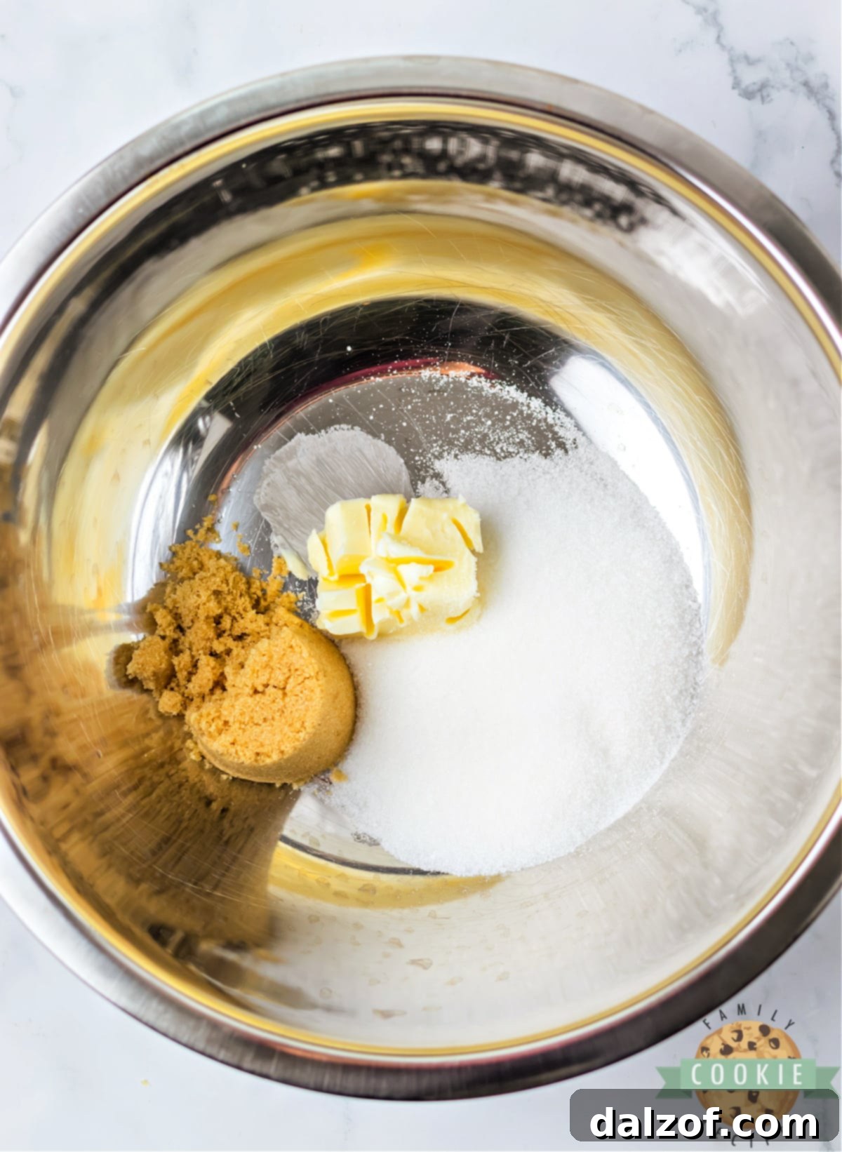 Cream butter and sugars together. 