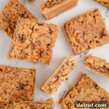 coconut dream bar squares arranged artfully, ready to be enjoyed