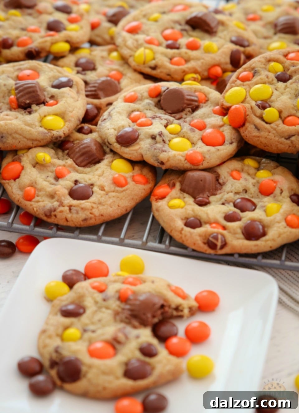 Perfectly baked Loaded Reese's Cookies on a cooling rack