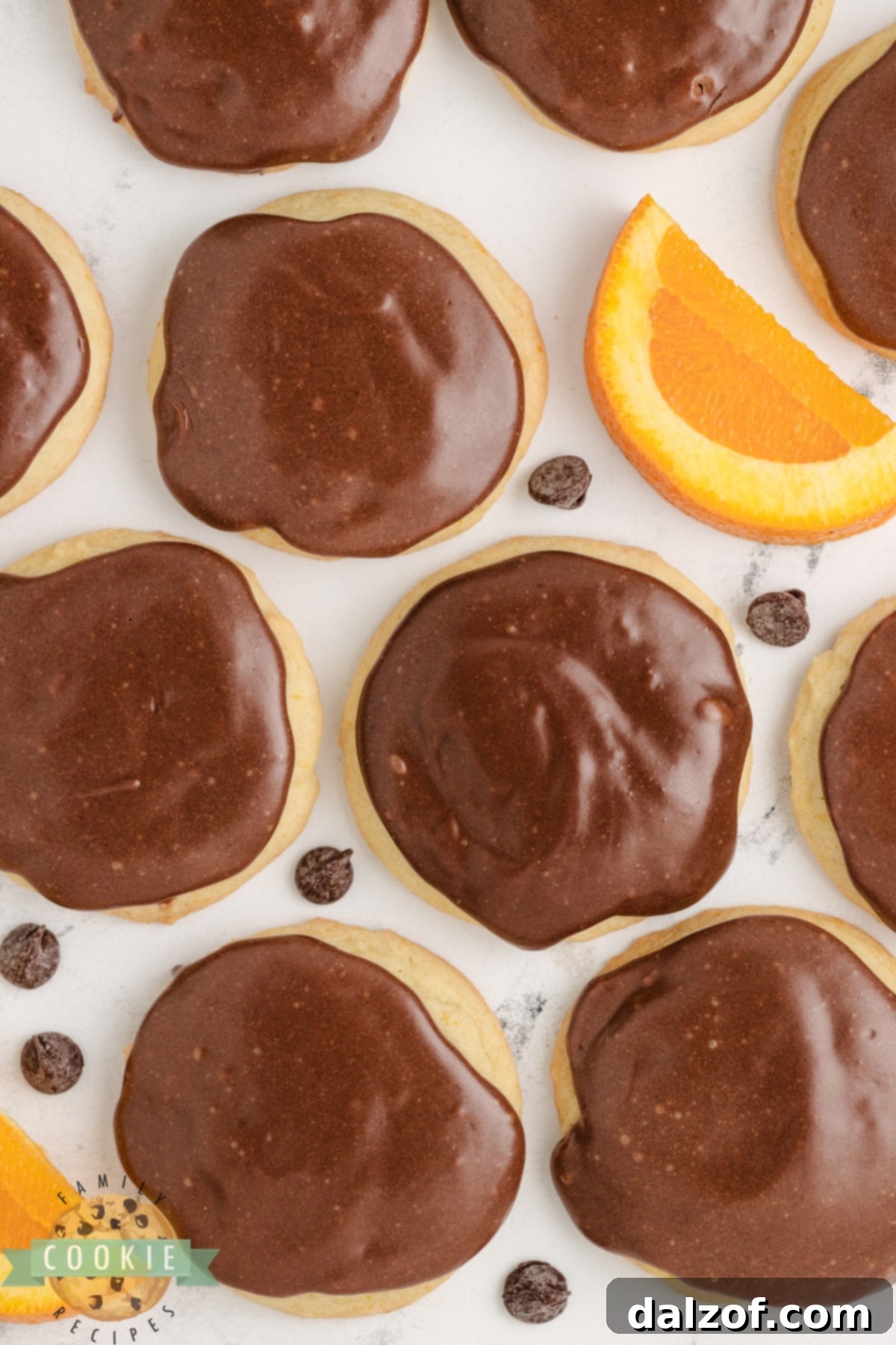 Orange cookies with fudge topping.