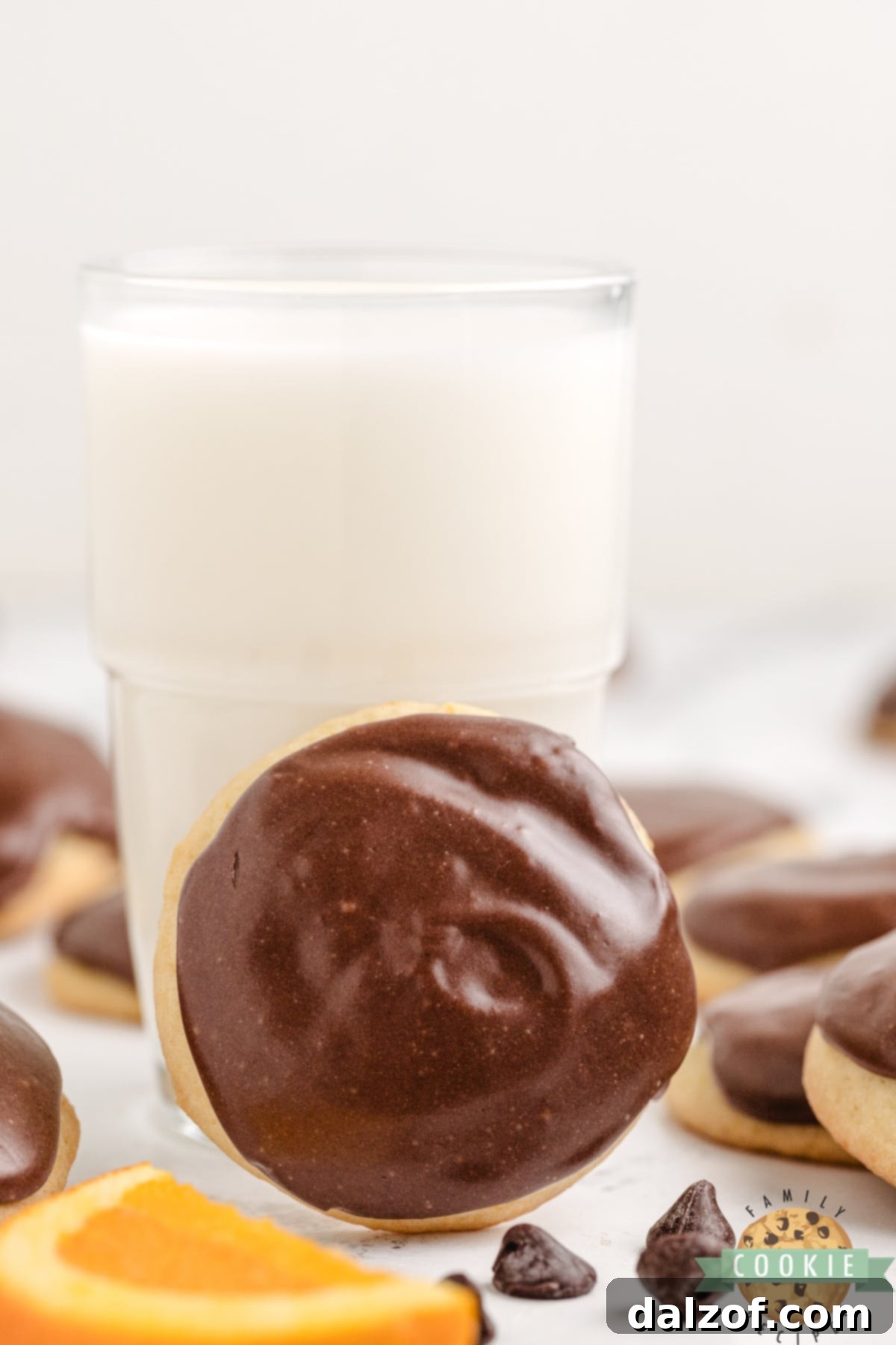 Orange cookies with chocolate topping. 