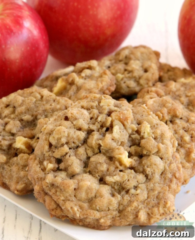 Caramel Apple Oatmeal Cookies are soft, chewy and full of fresh apples and caramel baking chips. Perfect cookie recipe for fall!