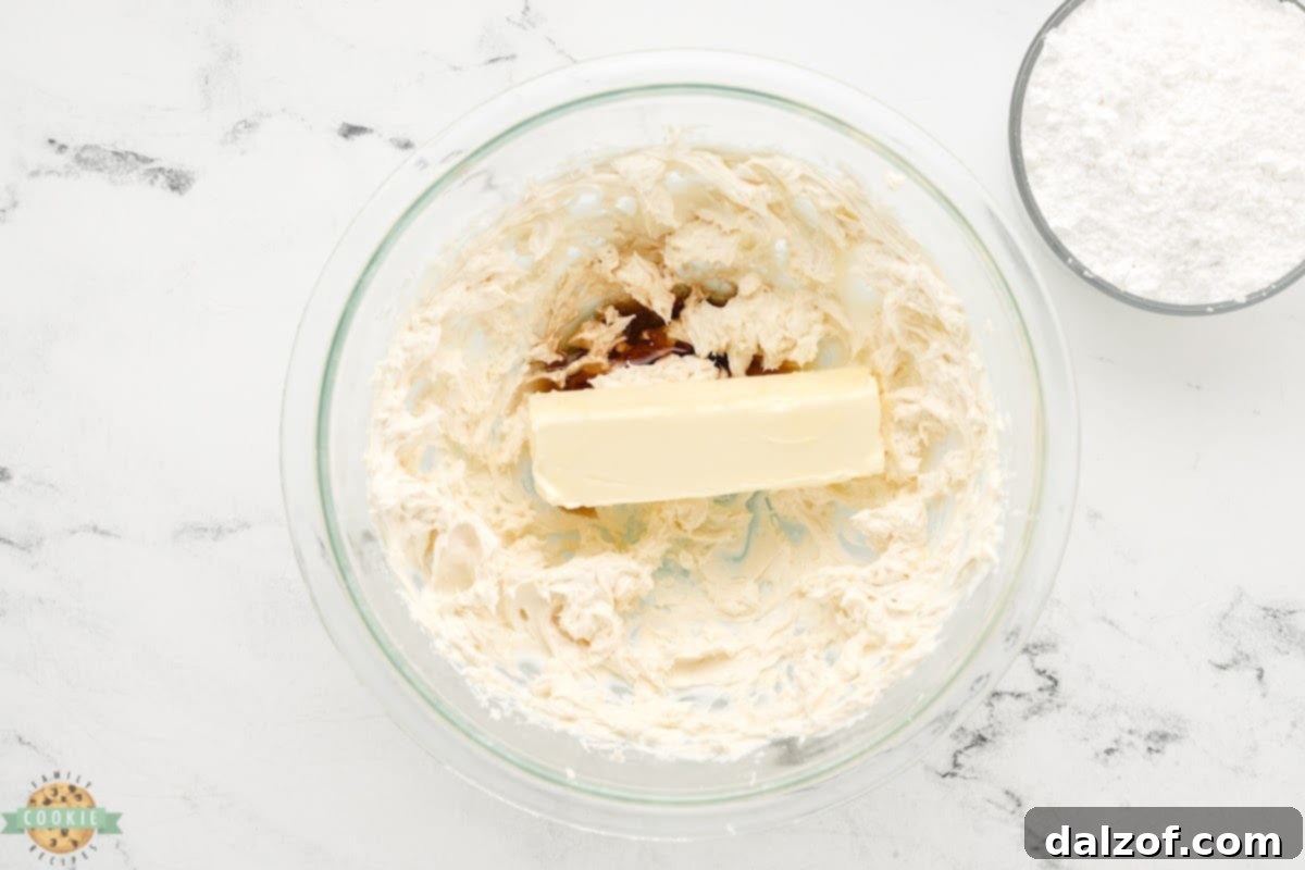 Add butter and vanilla to cream cheese frosting. 