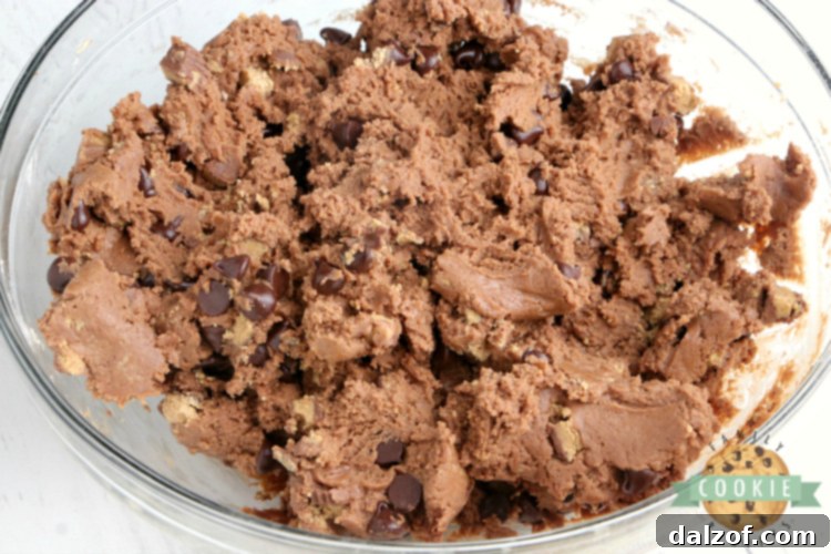 Chocolate cookie dough made with peanut butter cups and peanut butter.