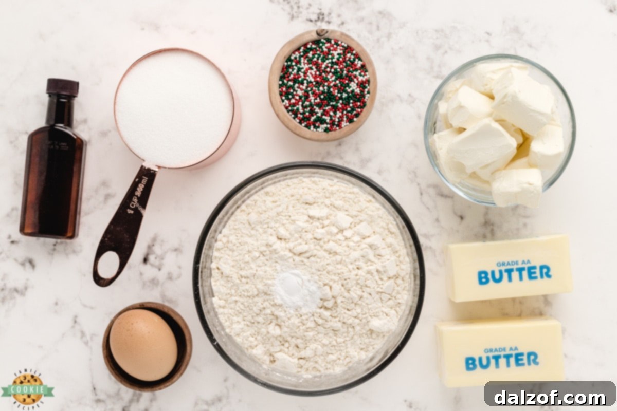 Ingredients in sugar cookie bars including butter, sugar, cream cheese, egg, extracts, and flour