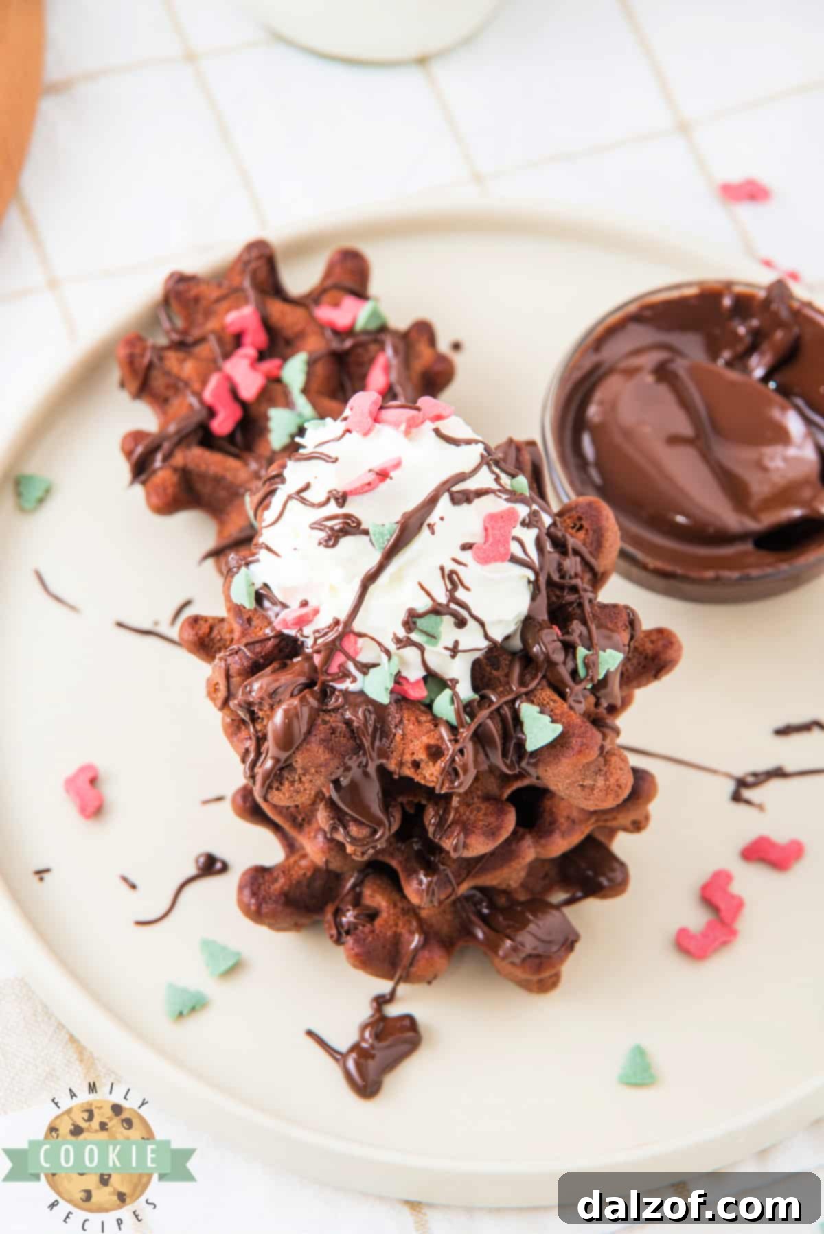 A charming holiday cookie arrangement featuring Christmas Chocolate Waffle Cookies.