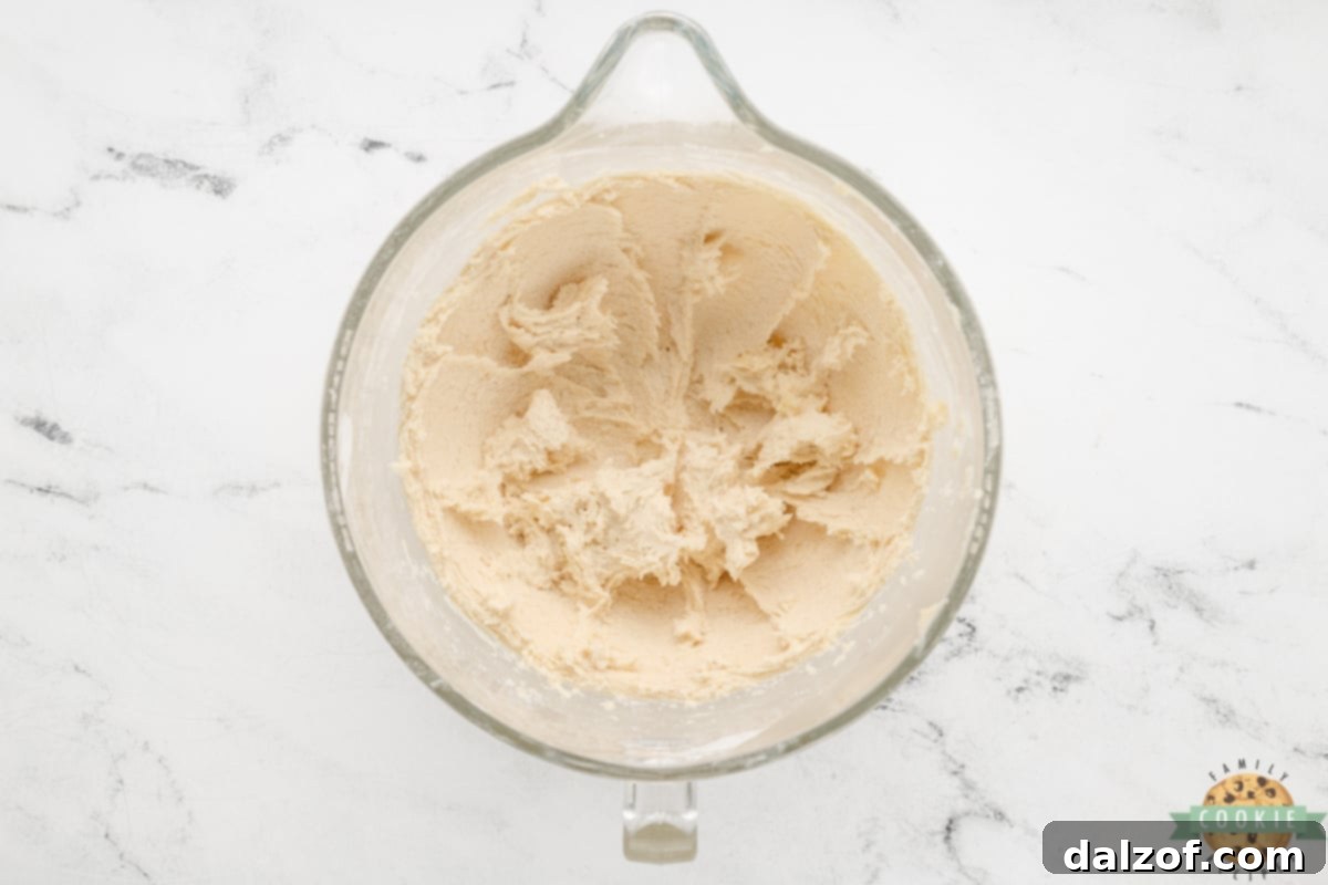 Smooth and simple shortbread cookie dough mixture in a bowl, ready for chilling.