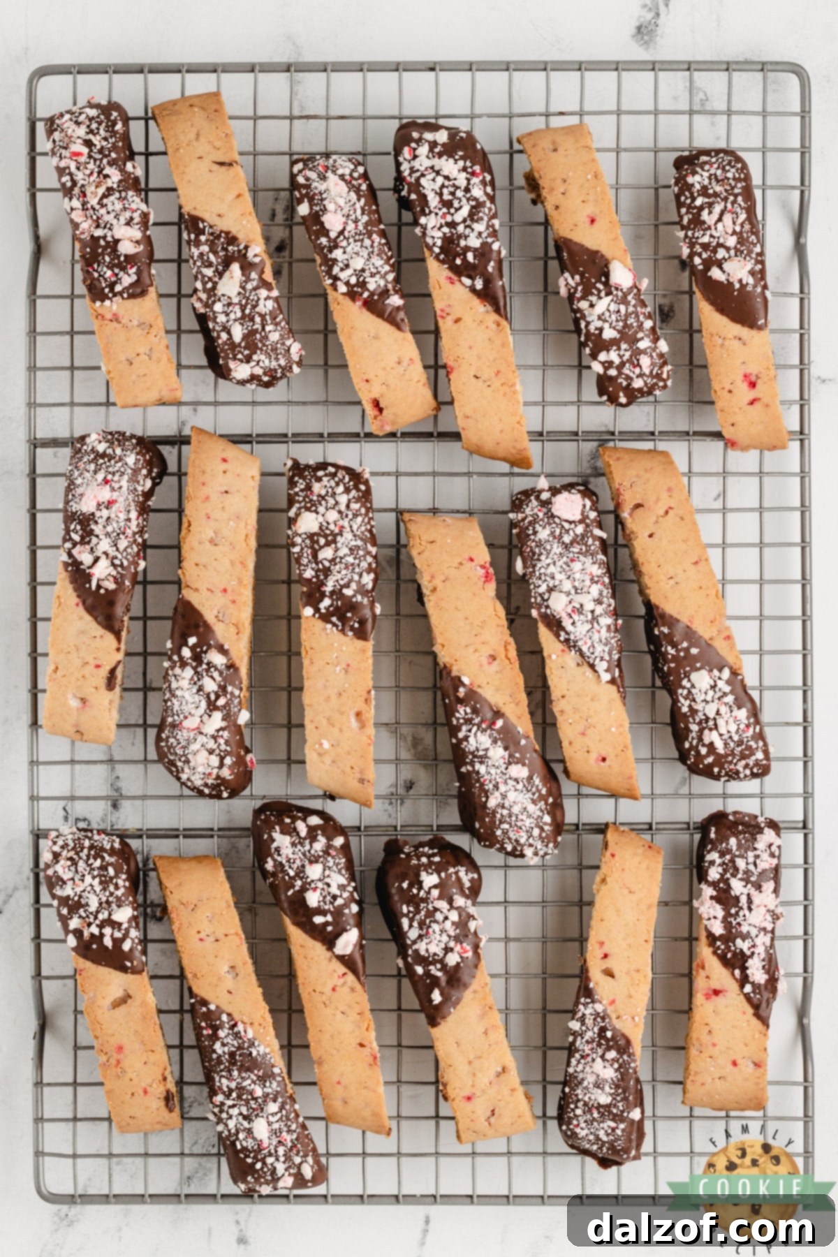 Peppermint biscotti dipped in chocolate and topped with crushed peppermint.