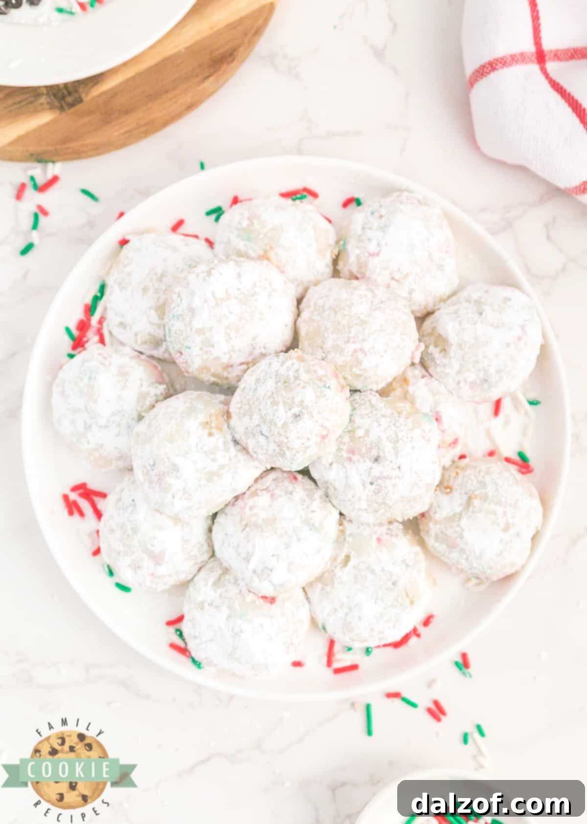 Christmas Snowball Cookies are sweet, buttery, and easy to make! Perfect holiday Snowball Cookies for cookie trays & gift exchanges.