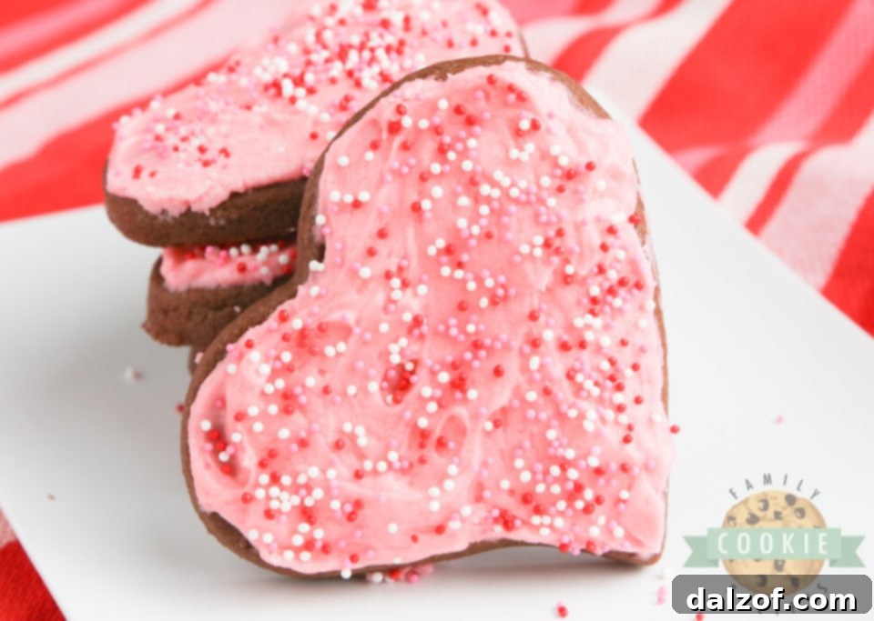 Frosted chocolate sugar cookies on a cooling rack