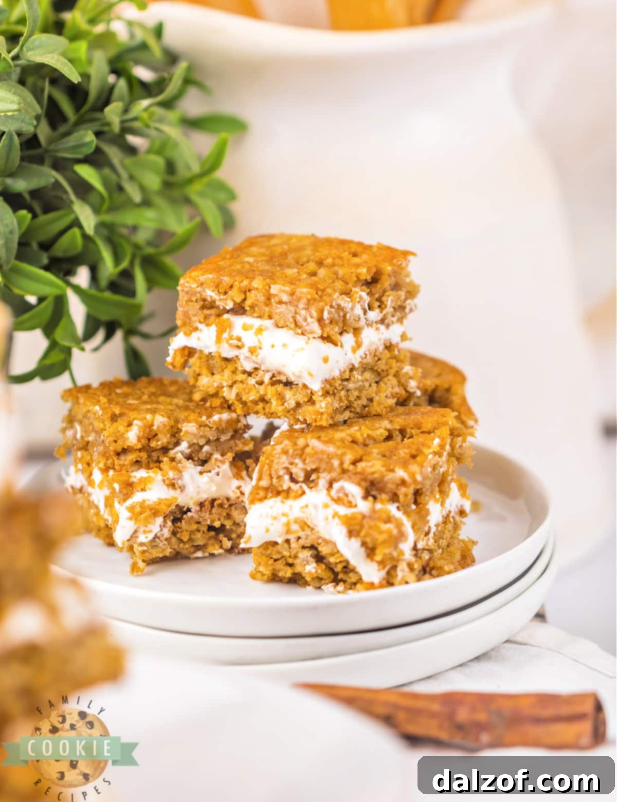 Delicious cookie bars with a generous layer of marshmallow filling in the middle, ready to be sliced and enjoyed.
