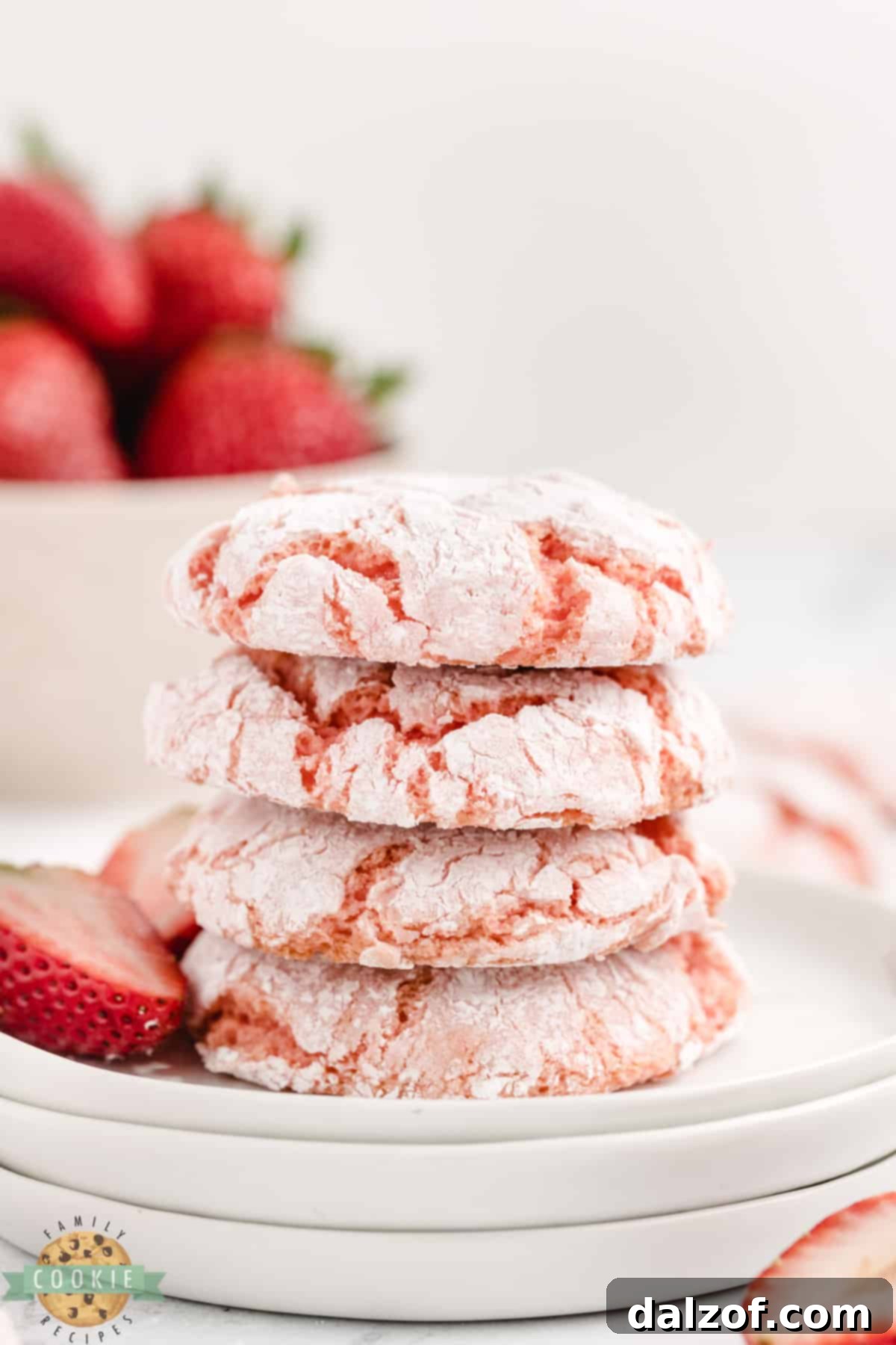 Freshly baked Strawberry Cool Whip Cookies on a wire rack, showcasing their vibrant pink hue and soft texture, ready to be enjoyed.