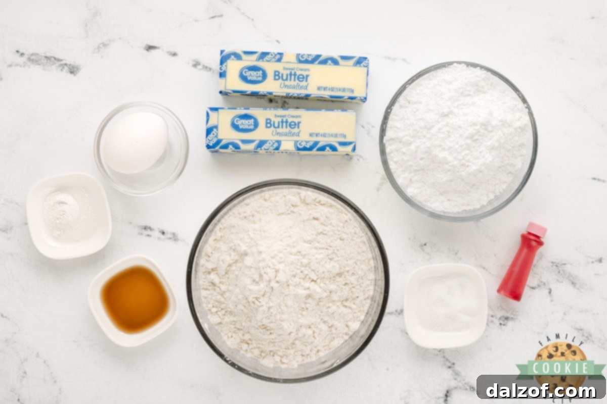 All the essential ingredients neatly laid out for making Braided Sweetheart Cookies, including butter, powdered sugar, flour, egg, vanilla extract, baking powder, salt, and red food coloring.