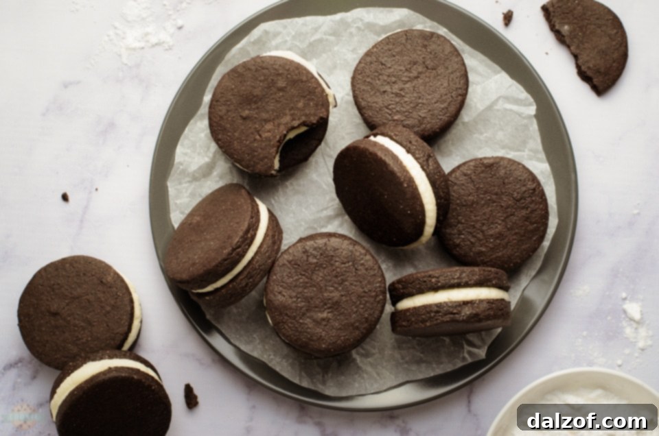 Homemade OREO Cookies: A close-up of the delicious vanilla cream filling