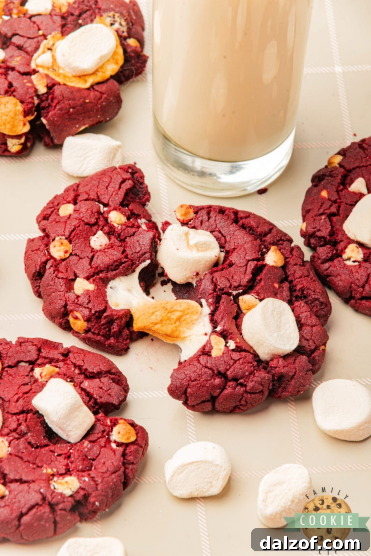 Red Velvet Marshmallow Cookies are made completely from scratch with white chocolate chips and mini marshmallows. These delicious cookies are soft, chewy, and absolutely delicious!