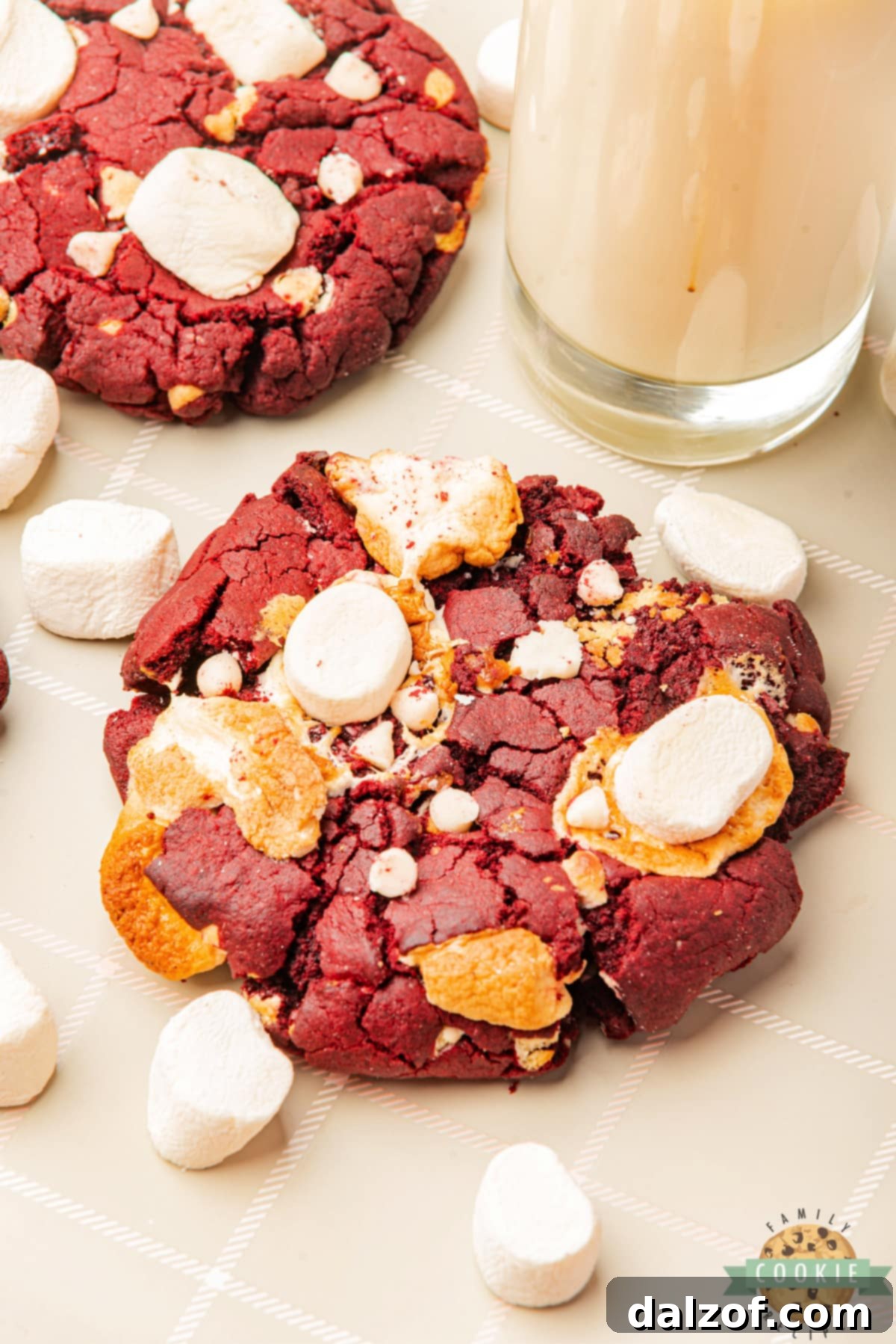 Red Velvet Marshmallow Cookies are made completely from scratch with white chocolate chips and mini marshmallows. These delicious cookies are soft, chewy, and absolutely delicious!