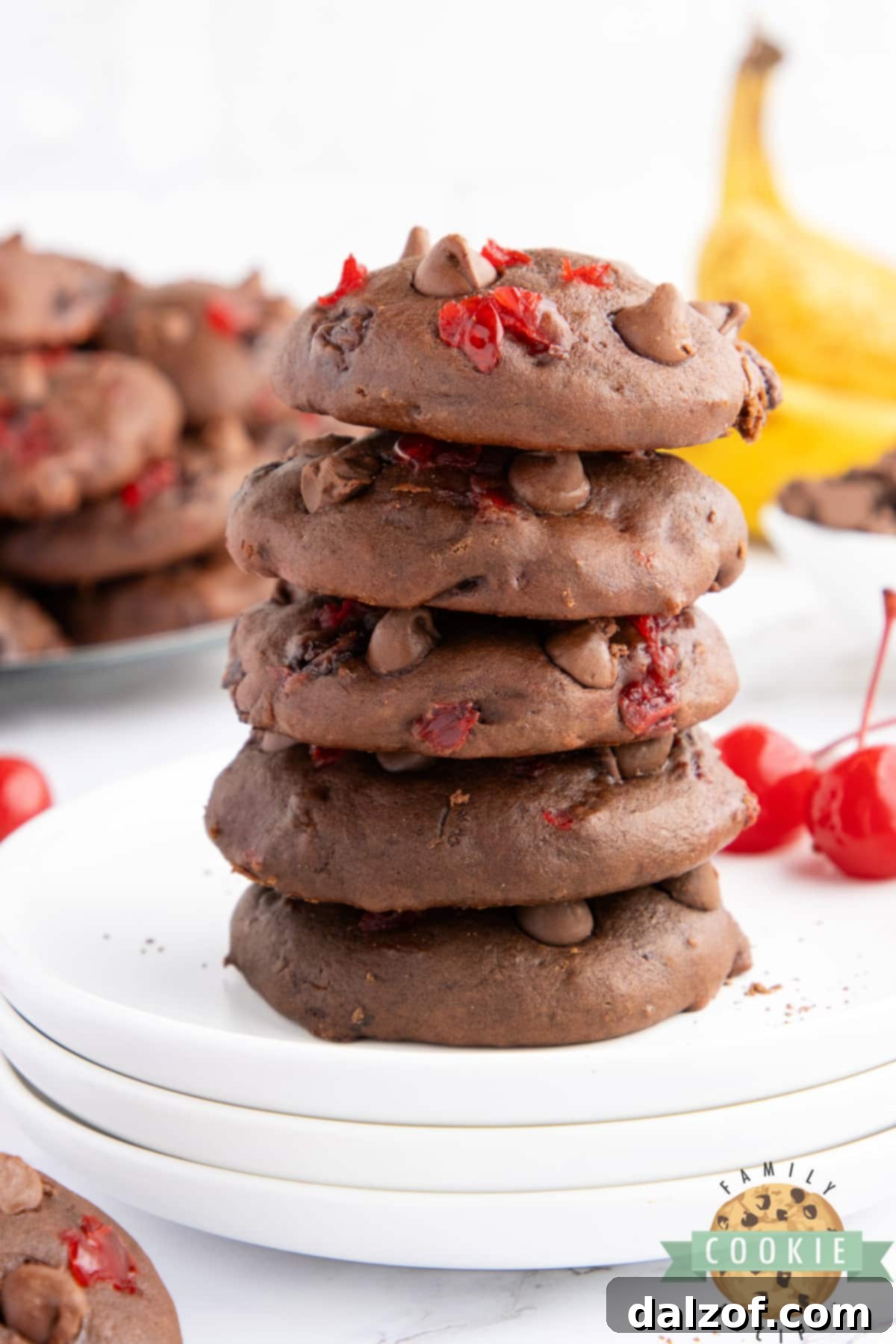 A beautifully arranged stack of chewy chocolate banana cookies, showcasing their inviting texture and rich color.