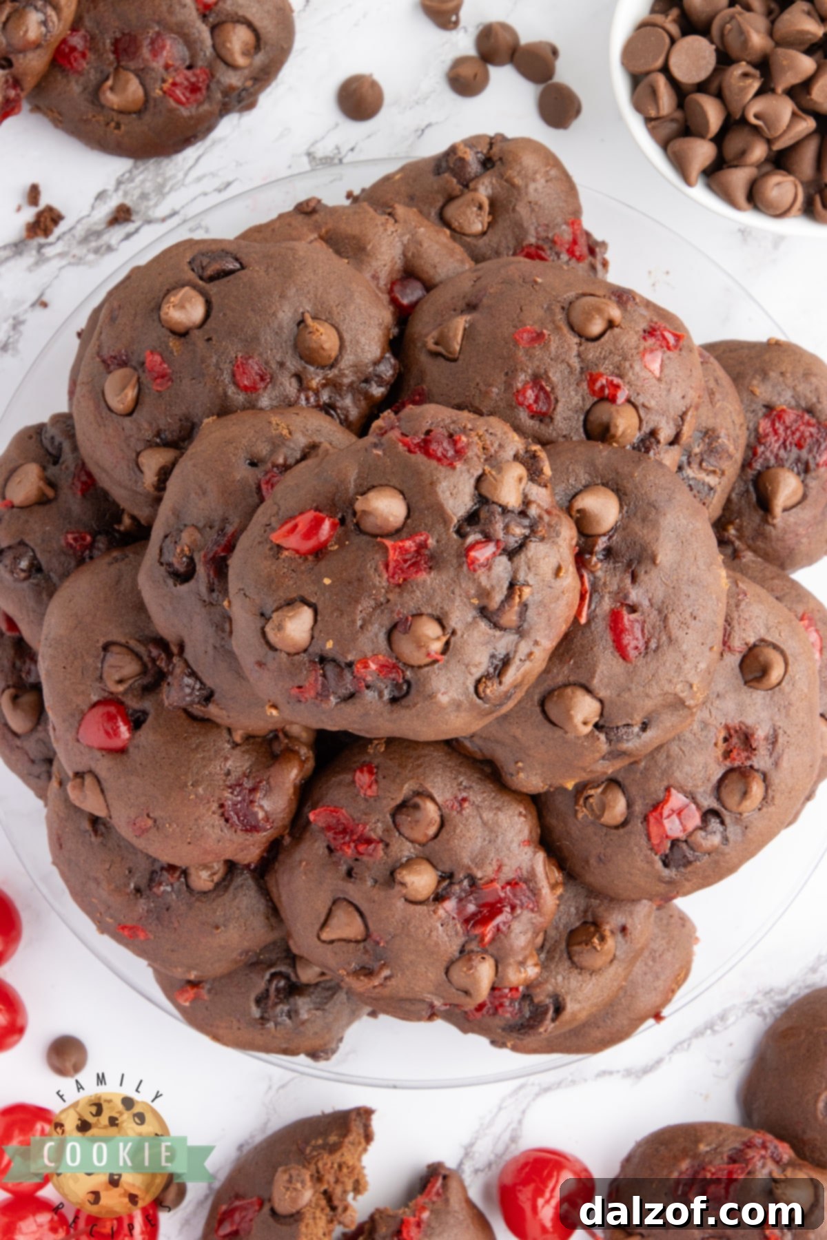 Double Chocolate Banana Split Cookies, homemade with sweet bananas, chocolate chips, and maraschino cherries. These chewy chocolate cookies capture the essence of a banana split, perfect with vanilla ice cream!