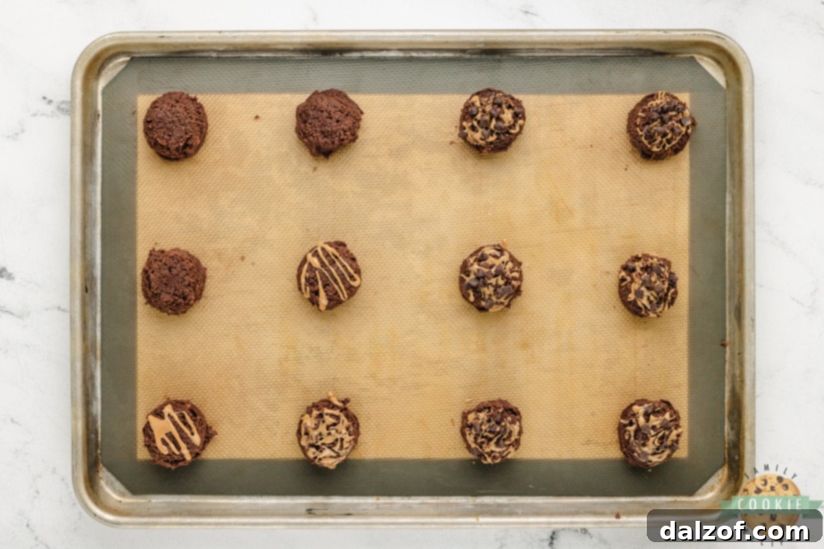 Cookie dough balls with peanut butter swirl and mini chocolate chips.
